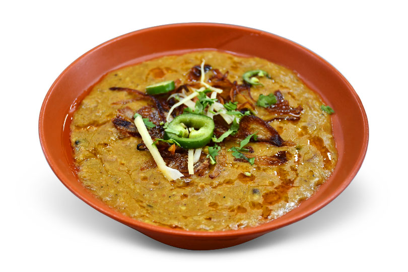 Beef haleem in Dubai topped with fried onions, ginger and lemon – B&B Restaurant